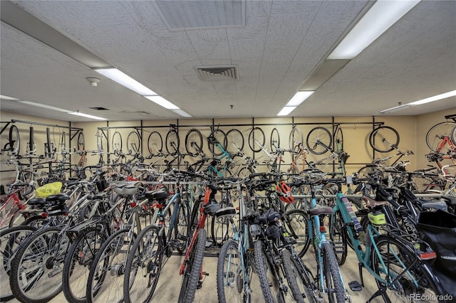 garage featuring bike storage and visible vents