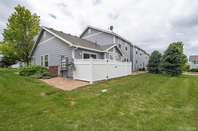 19249 E 58th Ave Unit D, Denver, CO 80249 - back of house with board and batten siding