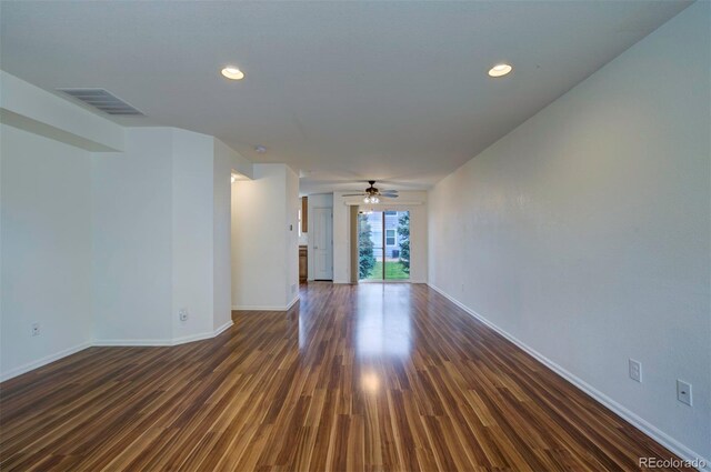 19249 E 58th Ave Unit D, Denver, CO 80249 - spare room featuring ceiling fan, baseboards, dark wood-type flooring, and recessed lighting