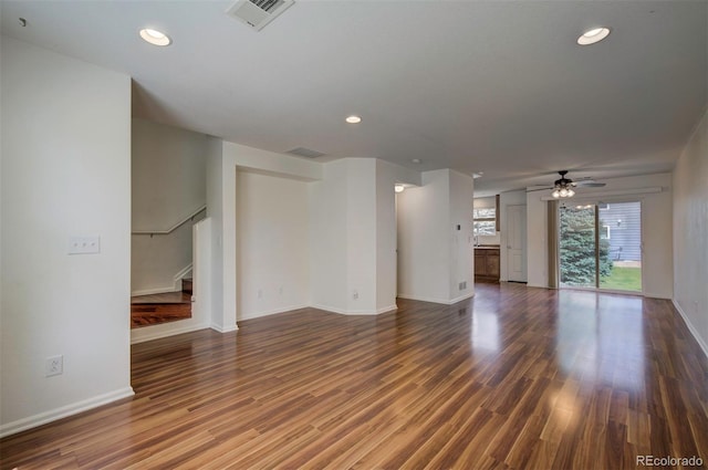 19249 E 58th Ave Unit D, Denver, CO 80249 - unfurnished living room featuring baseboards, stairs, ceiling fan, recessed lighting, and wood finished floors