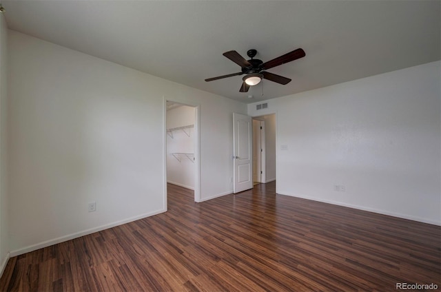 19249 E 58th Ave Unit D, Denver, CO 80249 - unfurnished room with ceiling fan, dark wood-type flooring, and baseboards