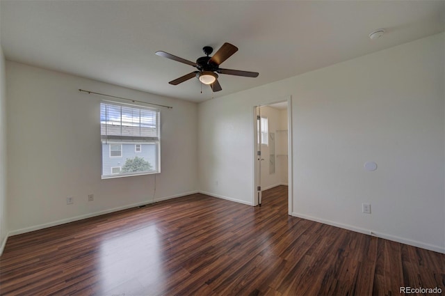 19249 E 58th Ave Unit D, Denver, CO 80249 - unfurnished room with dark wood-style flooring, ceiling fan, baseboards, and a smoke detector
