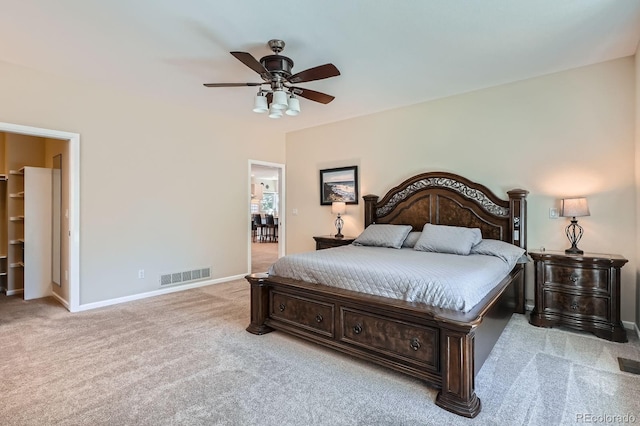 5461 S Youngfield Ct, Littleton, CO 80127 - carpeted bedroom with baseboards and a ceiling fan