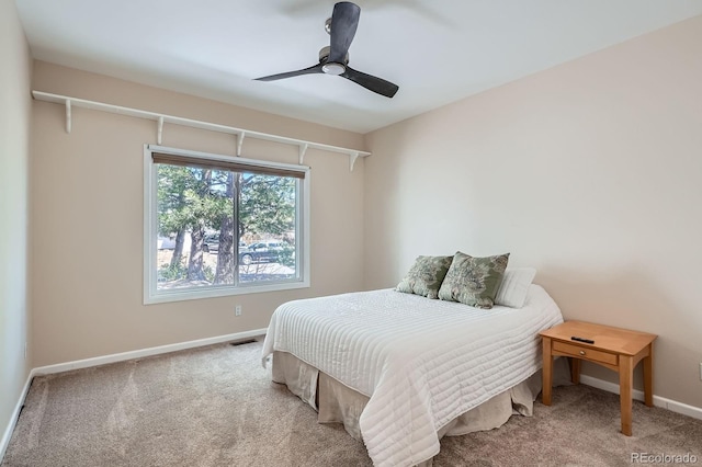5461 S Youngfield Ct, Littleton, CO 80127 - carpeted bedroom with baseboards and ceiling fan