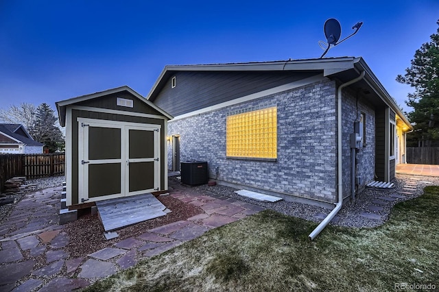 5461 S Youngfield Ct, Littleton, CO 80127 - back of house with cooling unit