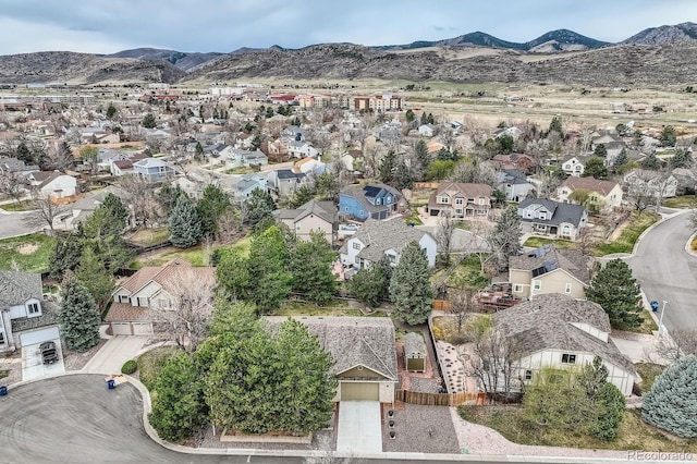 5461 S Youngfield Ct, Littleton, CO 80127 - aerial view of property's location with nearby suburban area and a mountainous background