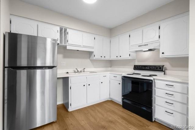 kitchen with sink, white cabinetry, light hardwood / wood-style flooring, black electric range, and stainless steel refrigerator