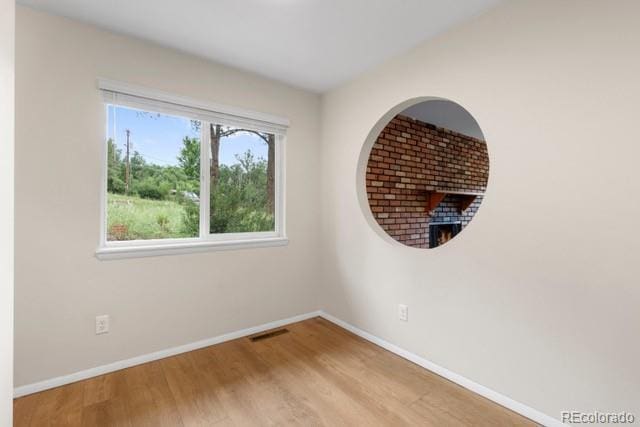 empty room featuring light hardwood / wood-style flooring