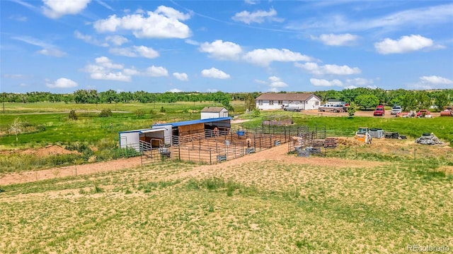369 S Bonnie Ln, Watkins, CO 80137 - view of yard with an exterior structure, a rural view, and an outbuilding