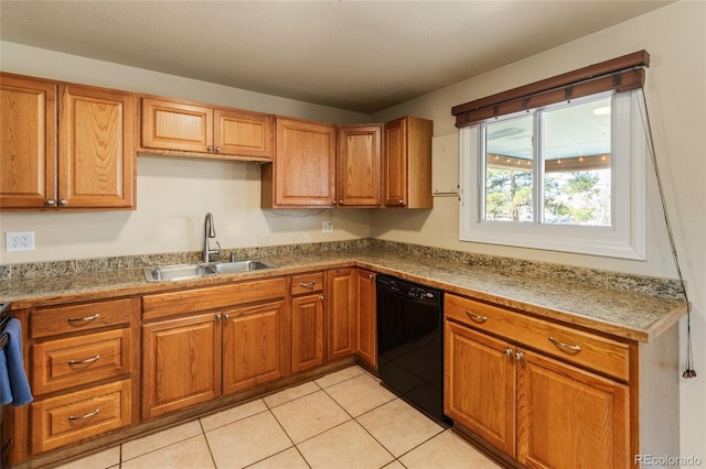 kitchen featuring light tile patterned flooring, brown cabinets, dishwasher, and a sink