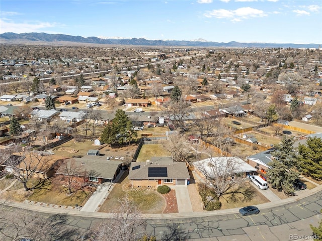 drone / aerial view featuring a mountain view and a residential view