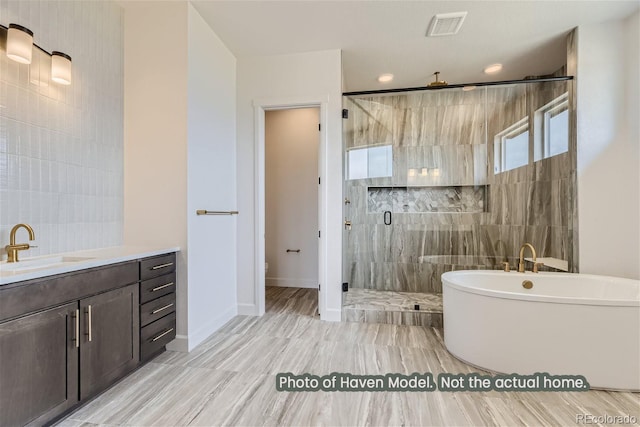 full bathroom featuring vanity, plus walk in shower, tile walls, and toilet