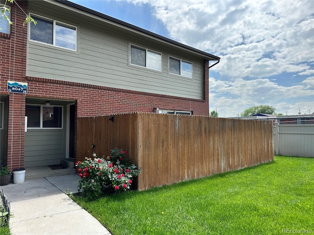 8047 Wolff St Unit H, Westminster, CO 80031 - view of side of home with brick siding
