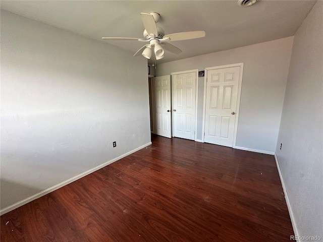 8047 Wolff St Unit H, Westminster, CO 80031 - unfurnished bedroom featuring baseboards, wood finished floors, and ceiling fan