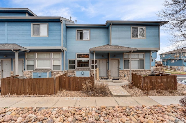 view of front of home featuring stone siding
