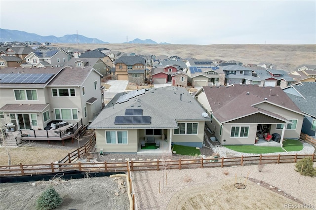 birds eye view of property featuring a residential view and a mountain view