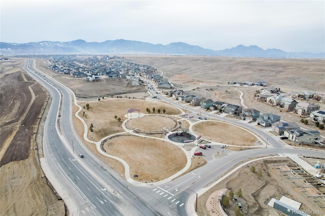 birds eye view of property featuring a mountain view