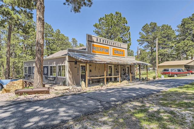 39867 Floyd St, Elizabeth, CO 80107 - view of front of home featuring driveway and a porch