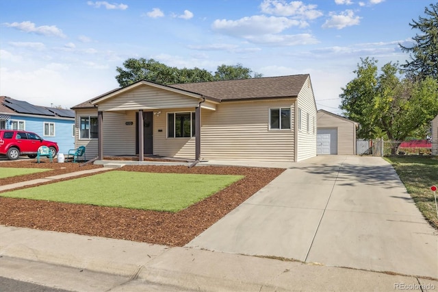 view of front of house with a garage, roof with shingles, an outdoor structure, and fence