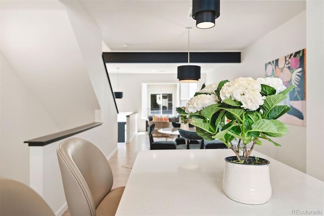 dining space featuring baseboards