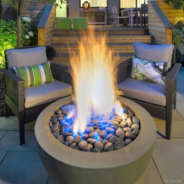 exterior space with a fireplace