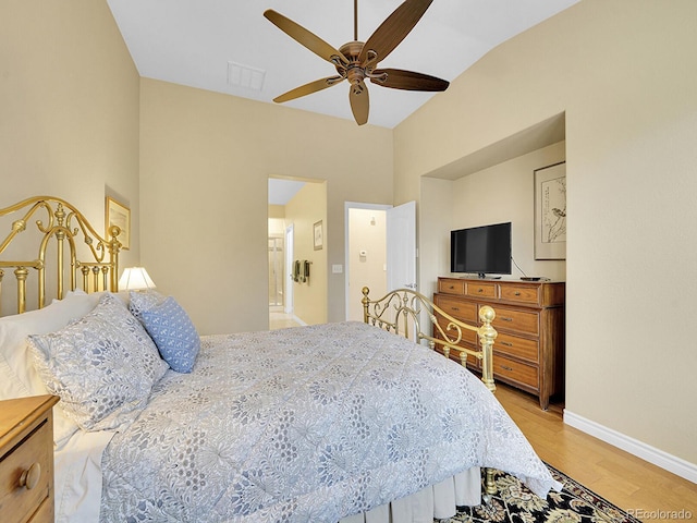 9246 Sori Ln, Highlands Ranch, CO 80126 - bedroom with light wood finished floors, baseboards, ceiling fan, and lofted ceiling