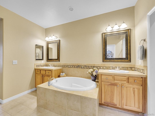 9246 Sori Ln, Highlands Ranch, CO 80126 - full bathroom with tile patterned flooring, a bath, two vanities, and baseboards