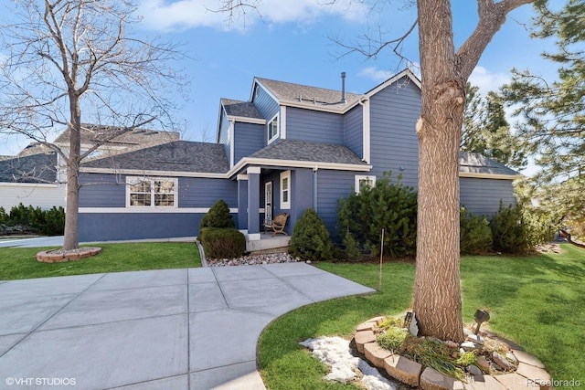 view of property featuring a front yard