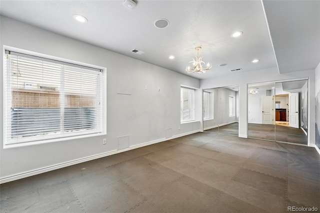 2832 Danbury Ave, Highlands Ranch, CO 80126 - unfurnished living room with a chandelier, plenty of natural light, recessed lighting, and baseboards