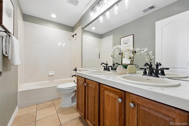 2832 Danbury Ave, Highlands Ranch, CO 80126 - full bath featuring double vanity, toilet, shower / bath combination, tile patterned flooring, and baseboards