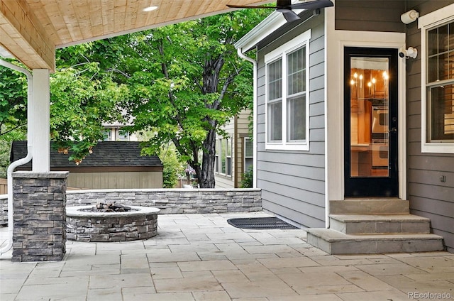 2832 Danbury Ave, Highlands Ranch, CO 80126 - view of patio featuring entry steps and an outdoor fire pit