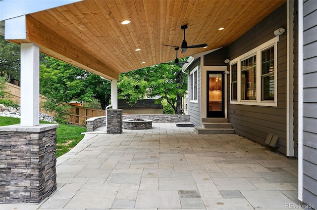 2832 Danbury Ave, Highlands Ranch, CO 80126 - view of patio featuring a fire pit, entry steps, and a ceiling fan