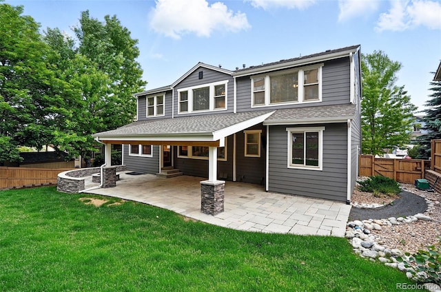 2832 Danbury Ave, Highlands Ranch, CO 80126 - back of house featuring a patio, a shingled roof, and entry steps