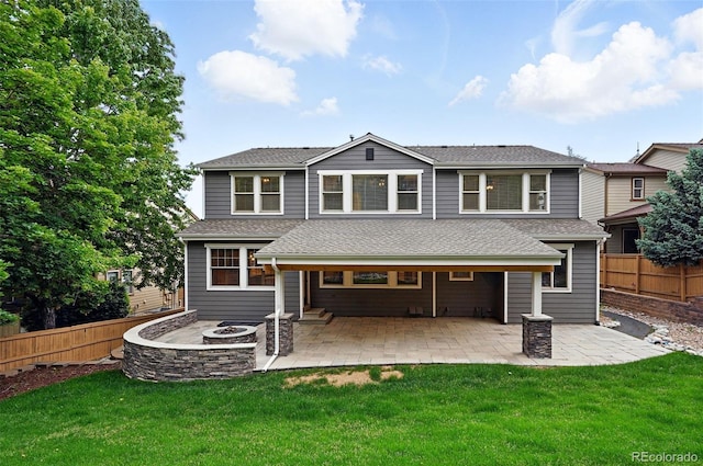 2832 Danbury Ave, Highlands Ranch, CO 80126 - rear view of property featuring a fire pit, a patio, and a shingled roof