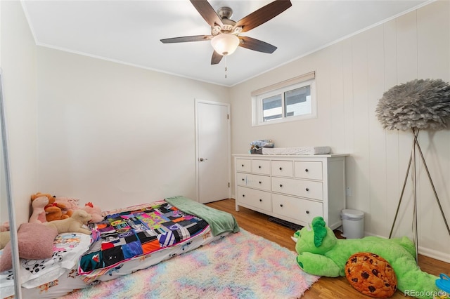 511 S Pennsylvania St, Denver, CO 80209 - bedroom featuring light wood-type flooring, ornamental molding, and a ceiling fan