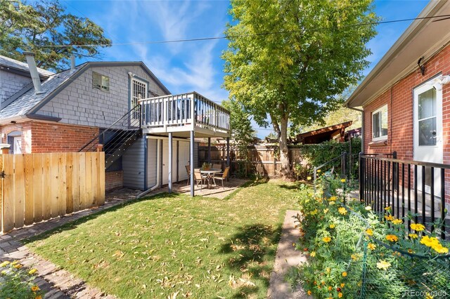 511 S Pennsylvania St, Denver, CO 80209 - view of yard with a wooden deck, stairway, and a patio