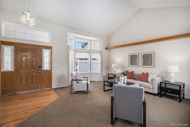8825 Fairview Oaks Pl, Lone Tree, CO 80124 - carpeted living area with high vaulted ceiling and a chandelier