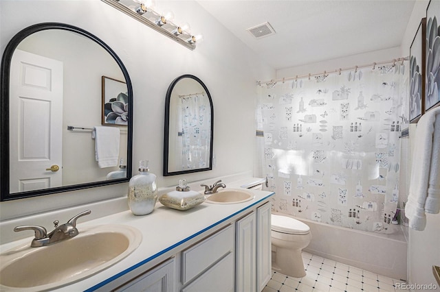 8825 Fairview Oaks Pl, Lone Tree, CO 80124 - bathroom featuring double vanity, shower / bath combo with shower curtain, and tile patterned floors