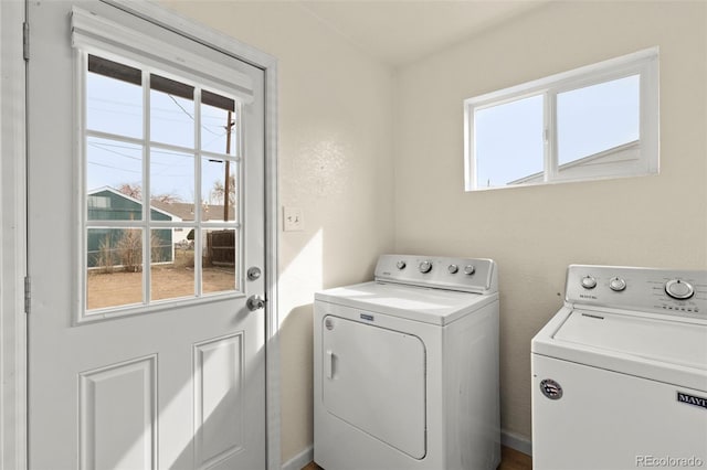 washroom with washer and dryer and laundry area