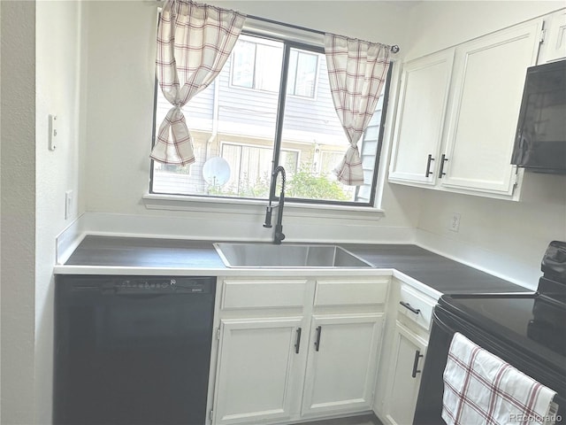 56 S Nome St, Aurora, CO 80012 - kitchen featuring black appliances and white cabinets