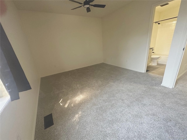 56 S Nome St, Aurora, CO 80012 - unfurnished bedroom with carpet floors, ensuite bath, and ceiling fan