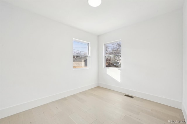 empty room featuring light hardwood / wood-style floors