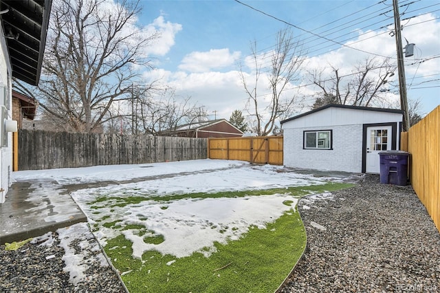 view of yard covered in snow