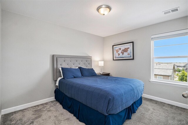 3453 Pacific Peak Dr, Broomfield, CO 80023 - carpeted bedroom featuring baseboards