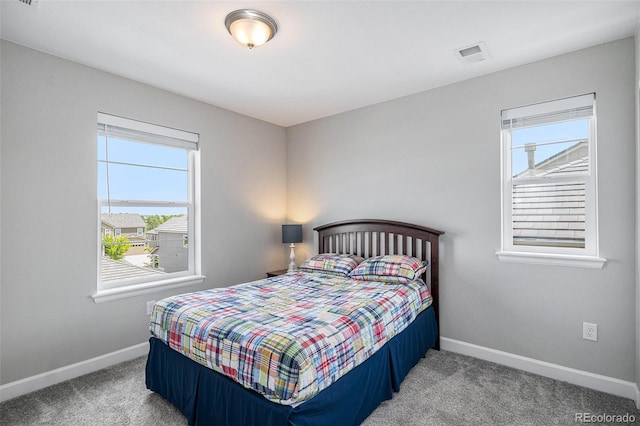 3453 Pacific Peak Dr, Broomfield, CO 80023 - carpeted bedroom featuring baseboards