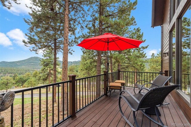 deck featuring a mountain view