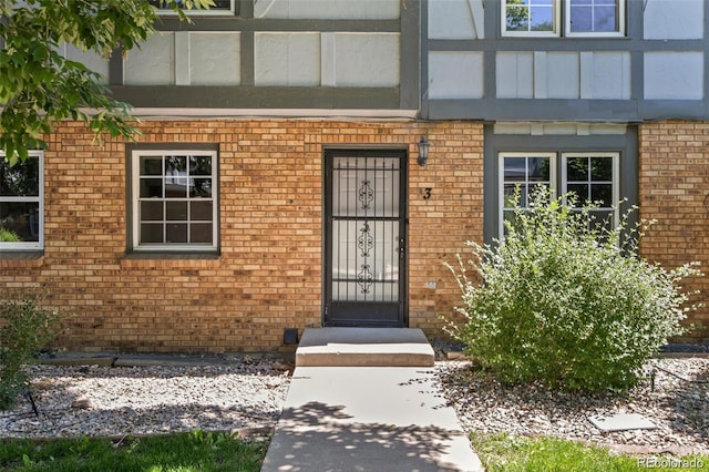 677 Vrain St Unit 3, Denver, CO 80204 - doorway to property featuring brick siding