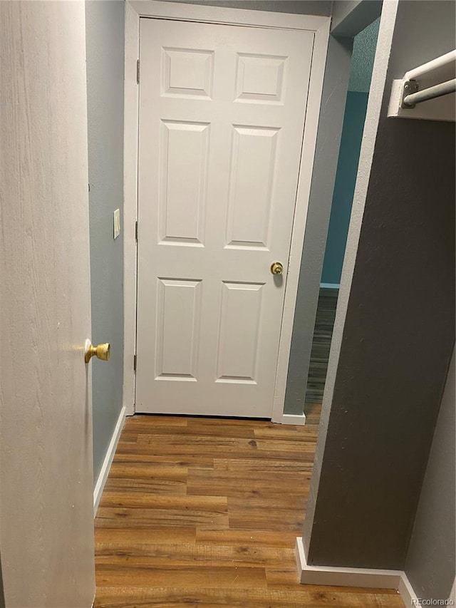 677 Vrain St Unit 3, Denver, CO 80204 - hall featuring baseboards and wood finished floors