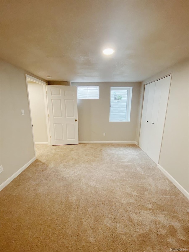 3000 Billings St, Aurora, CO 80011 - basement with light carpet and baseboards