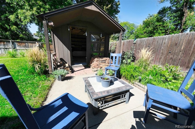 view of patio / terrace with an outdoor structure